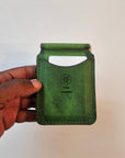 Handcrafted electric green leather money clip with vibrant finish by Tad Leathers