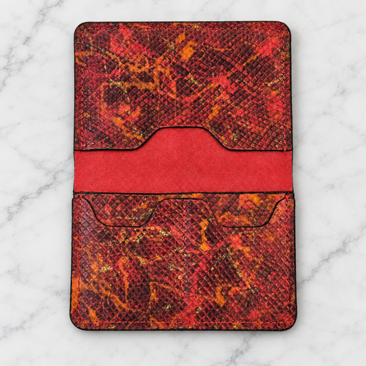 Inferno Python Leather Passport Holder on light marble background