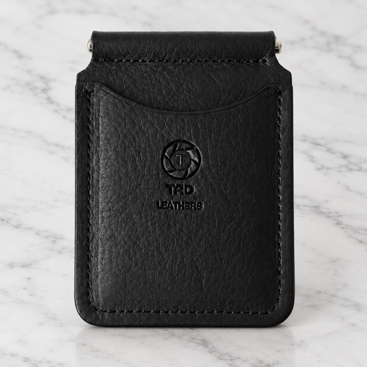 Black Leather Money Clip Wallet on light marble background