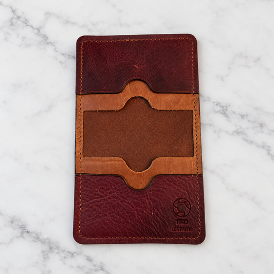 Multi-Brown Slim Leather Wallet on light marble background