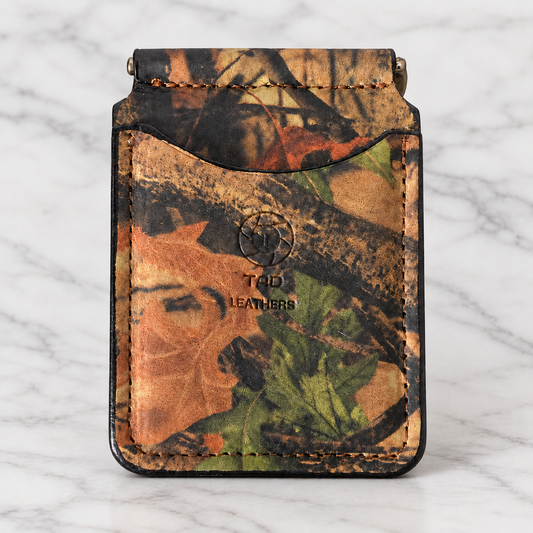 Backwoods Camo Spring-Bar Money Clip Wallet on light marble background