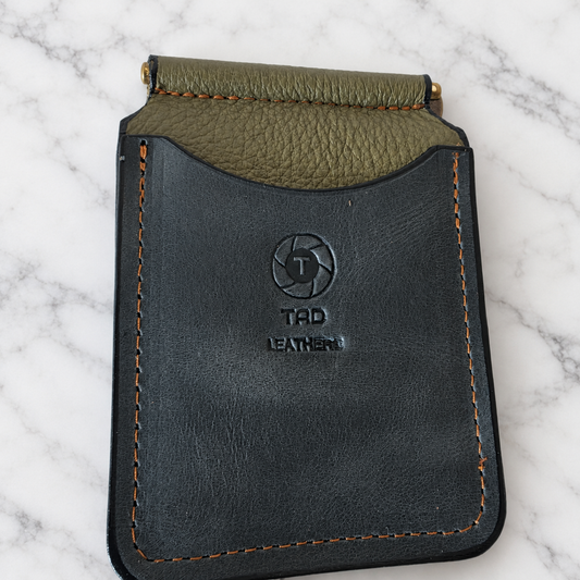 Shadow Olive Leather Spring-Bar Money Clip Wallet on light marble background