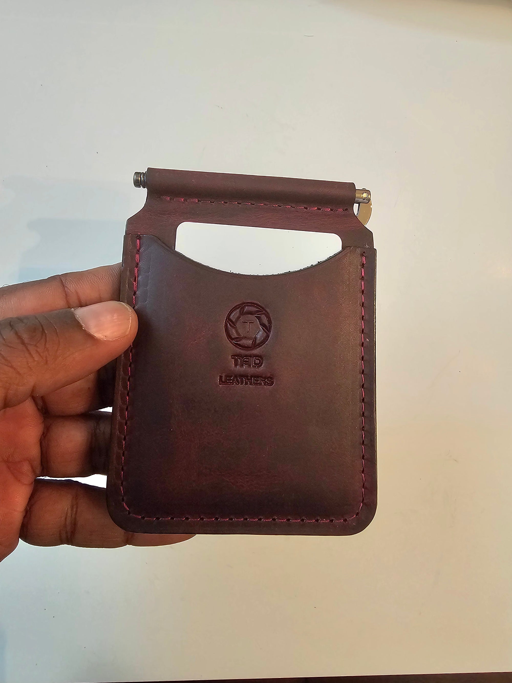 Handcrafted volcano red textured leather money clip by Tad Leathers