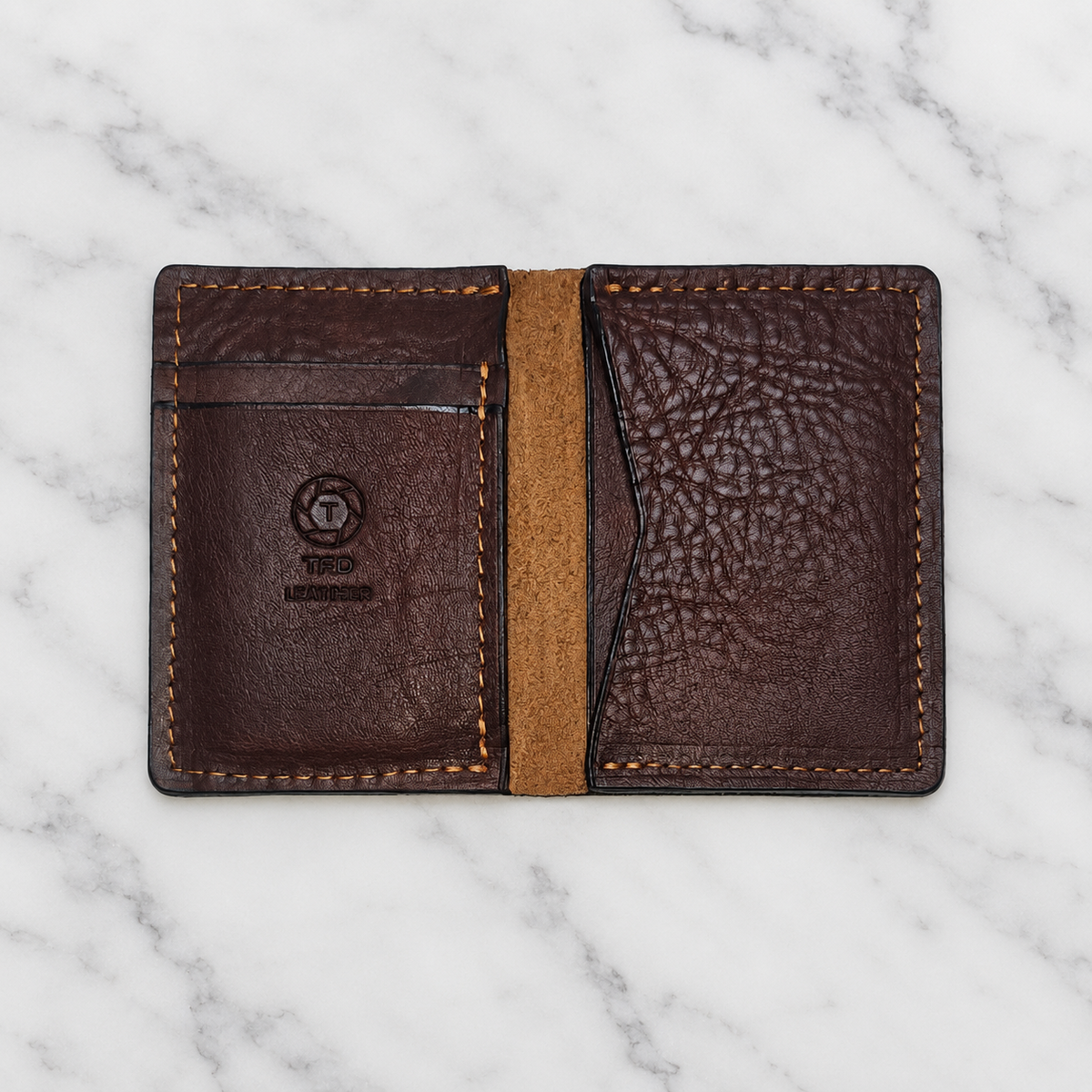 Brown Pebble Grain Minimalist Wallet on light marble background