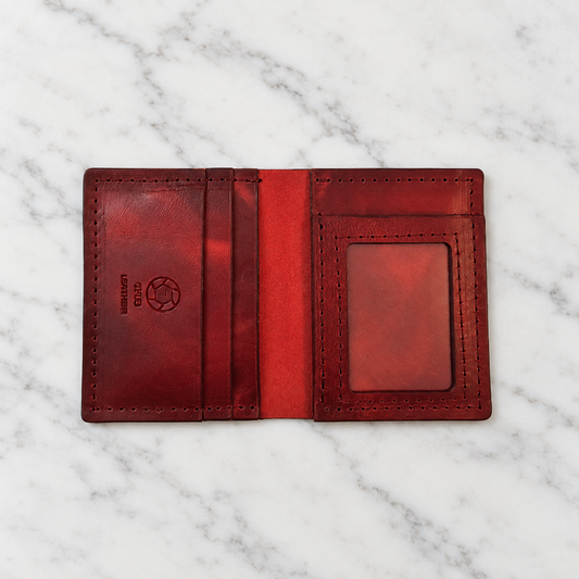 Red Full-Grain Leather ID Wallet on light marble background