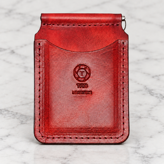 Red Leather Money Clip Wallet on light marble background