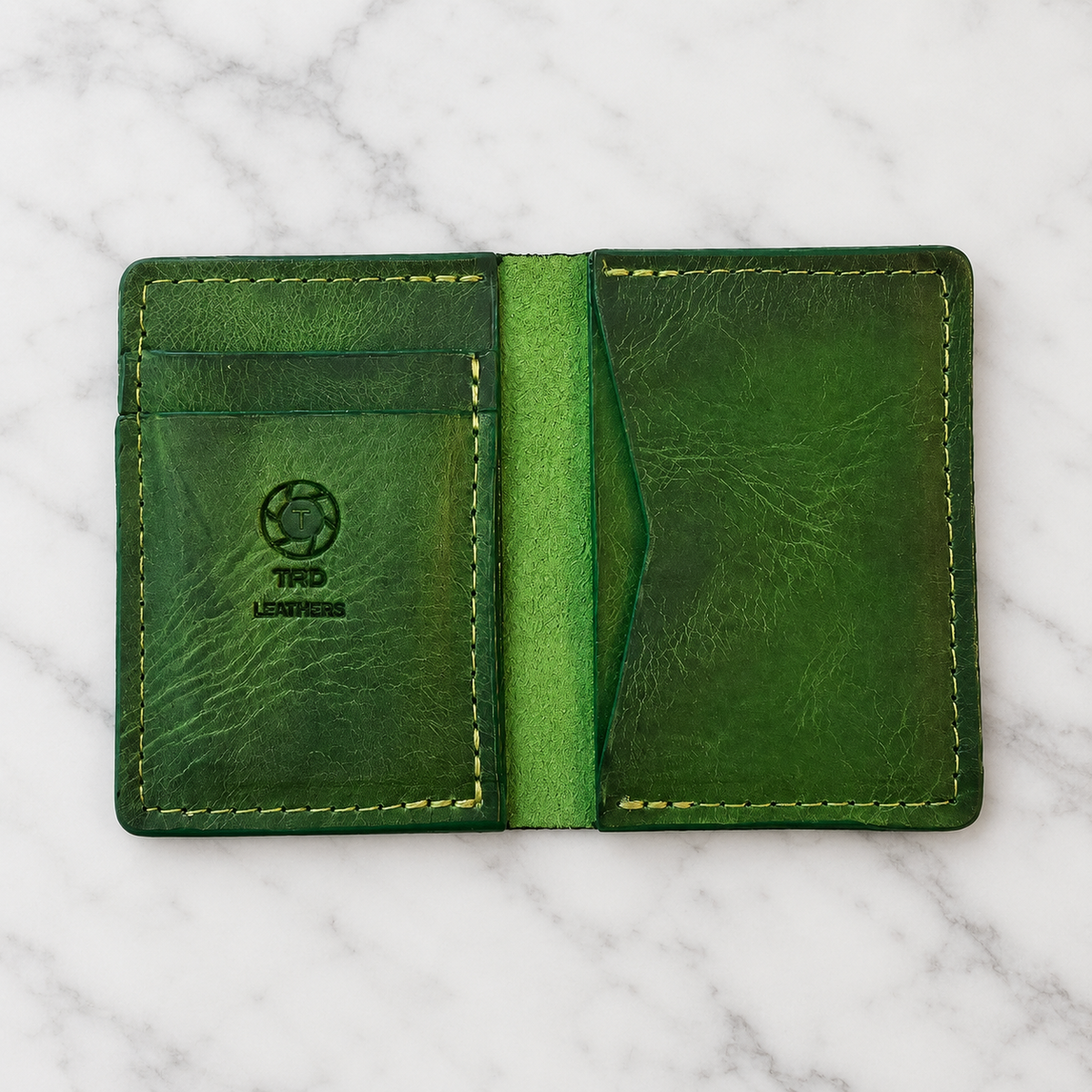 Minimalist Wallet (Vibrant Green) on light marble background