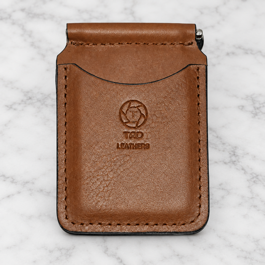 Bourbon Brown Pebbled Leather Money Clip Wallet on light white and gray marble background