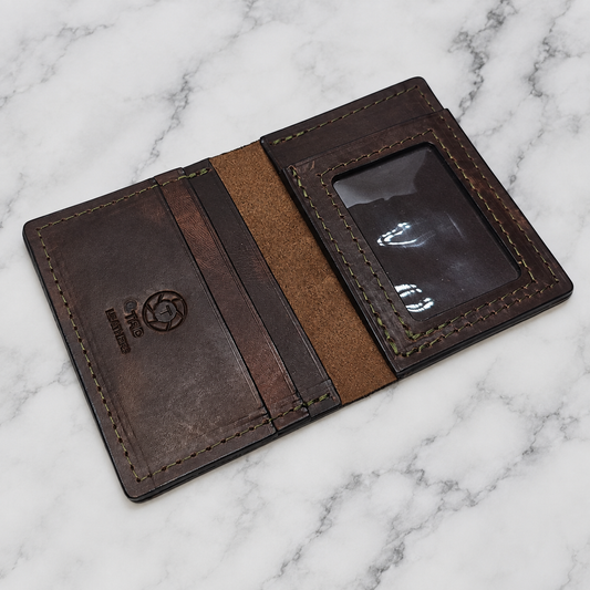 Brown Leather ID Wallet on light white and gray marble background