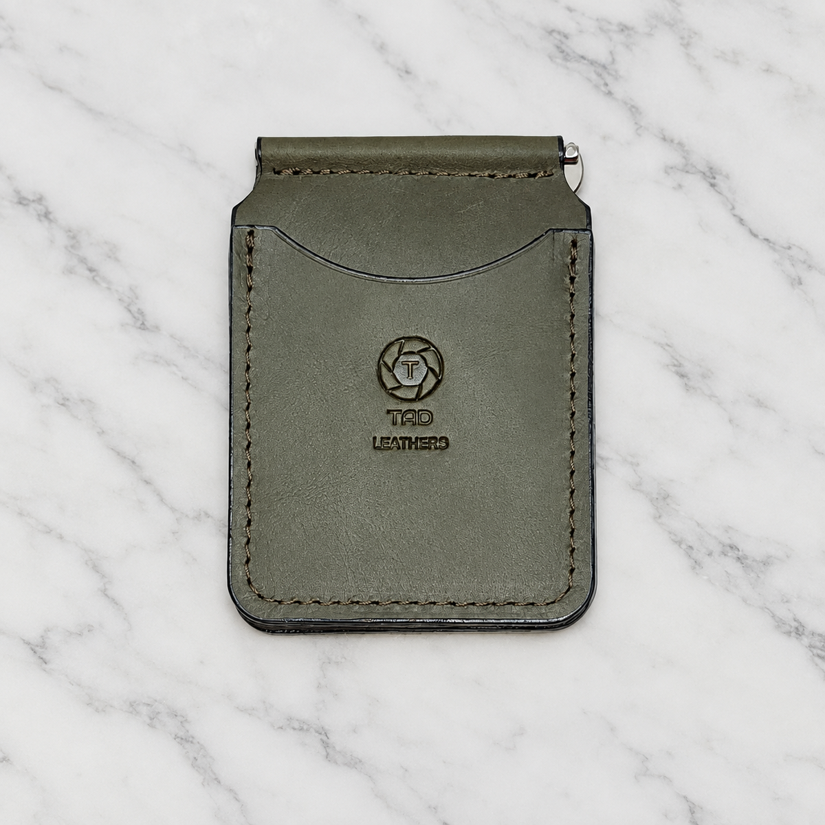 Sage Green Leather Money Clip Wallet on light marble background