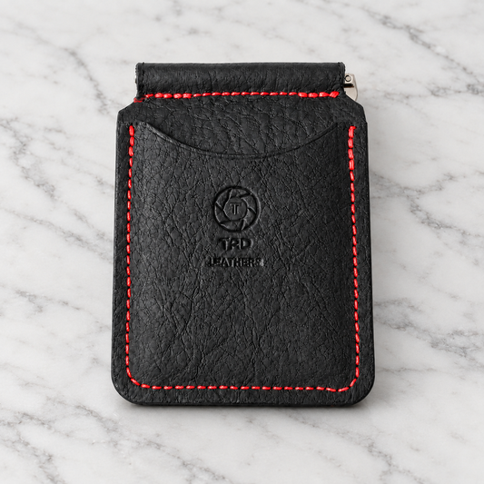Black & Red Leather Money Clip Wallet on light marble background