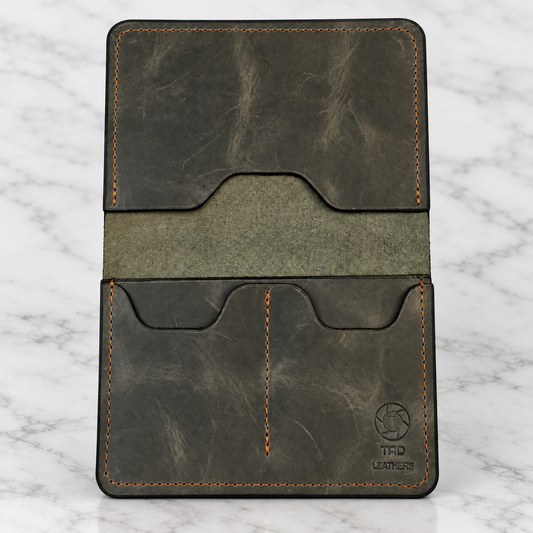 Army Green Leather Passport Holder on light marble background