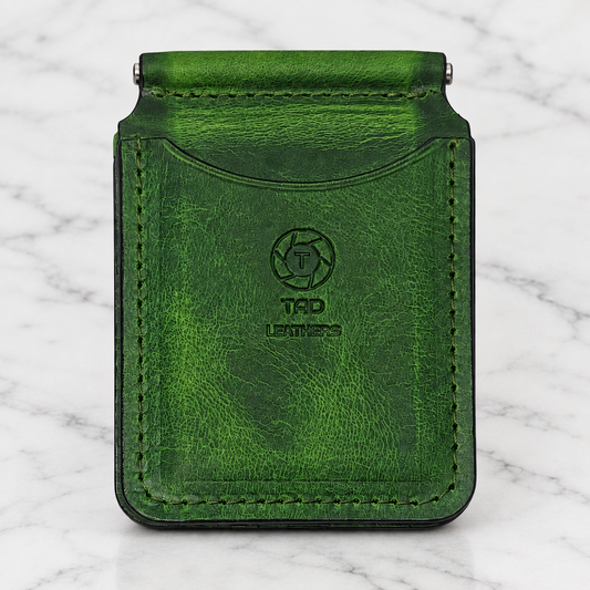 Forest Green Leather Money Clip Wallet on light marble background