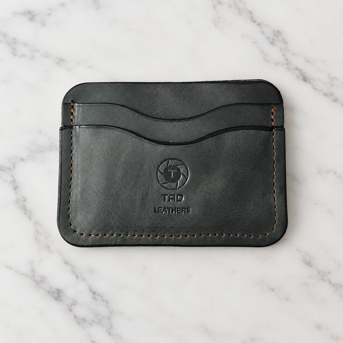 Green Full-Grain Leather Cardholder on light marble background