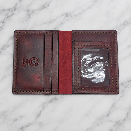 Bourbon Reserve Leather ID Wallet on light white and gray marble background