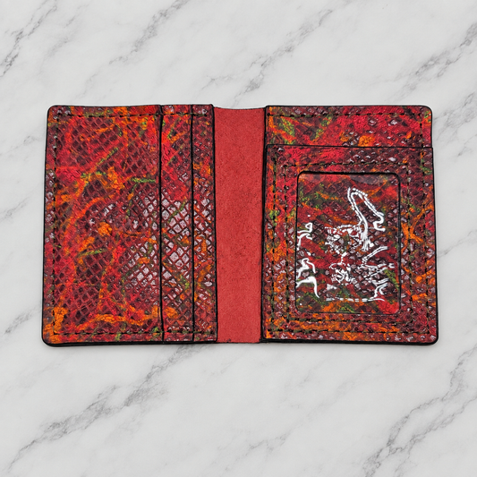 Lava Python-Embossed Leather ID Wallet on light white and gray marble background