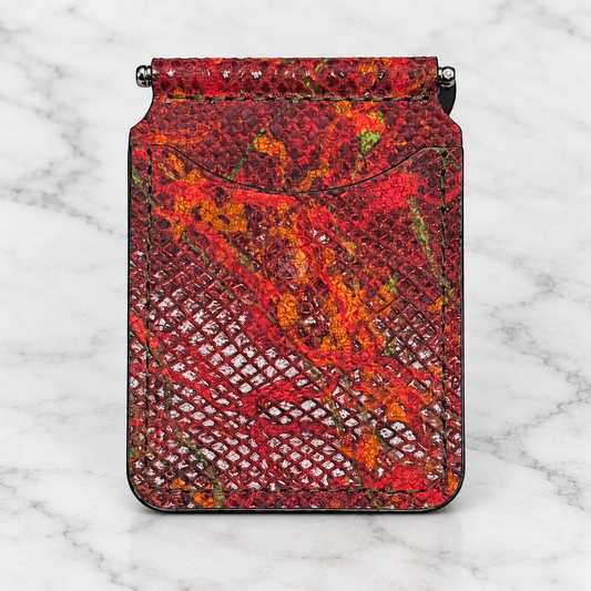 Crimson Python-Embossed Money Clip Wallet on light marble background
