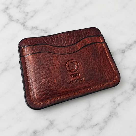 Compact Full-Grain Card Holder on light marble background