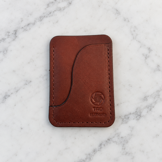 Tan Leather Card Holder - Minimalist & Slim Design on light marble background