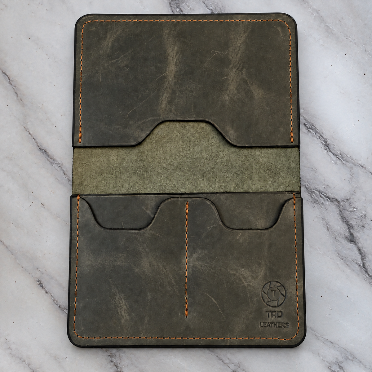 Army Green Leather Passport Holder on natural gray marble background