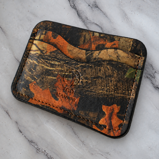 Backwoods Camo Leather Cardholder on natural gray marble background