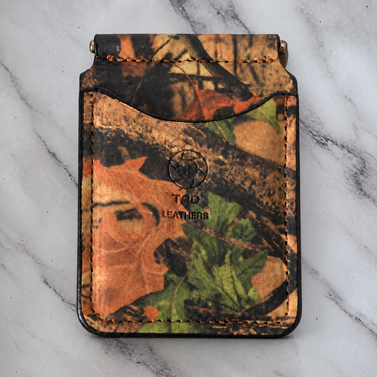 Backwoods Camo Spring-Bar Money Clip Wallet on natural gray marble background