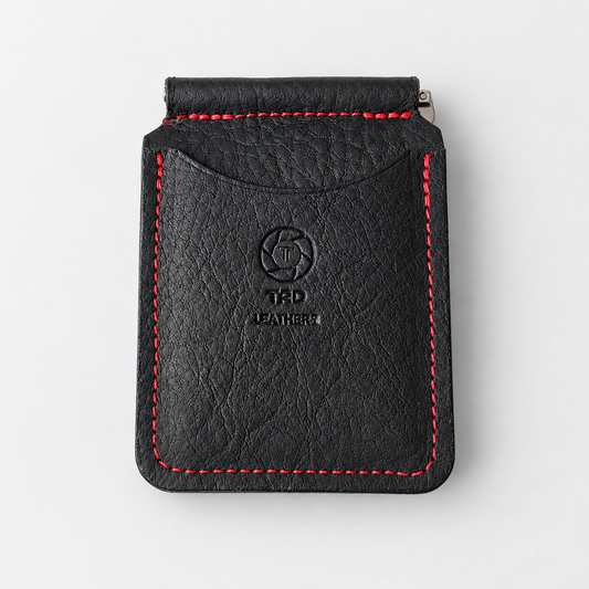 Black full-grain leather money clip wallet with red stitching, handcrafted by Tad Leathers