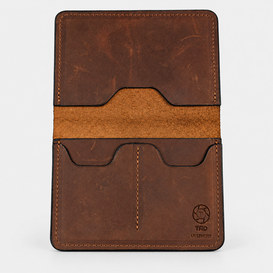 Brown handmade leather passport holder by Tad Leathers