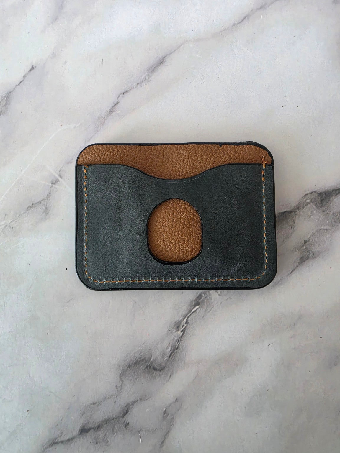 Charcoal and saddle brown back of one-of-one leather cardholder