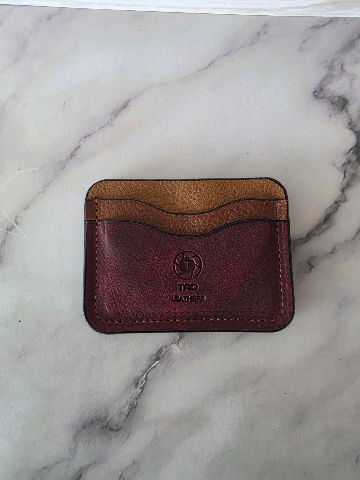 Burgundy and saddle brown one-of-one leather cardholder front view