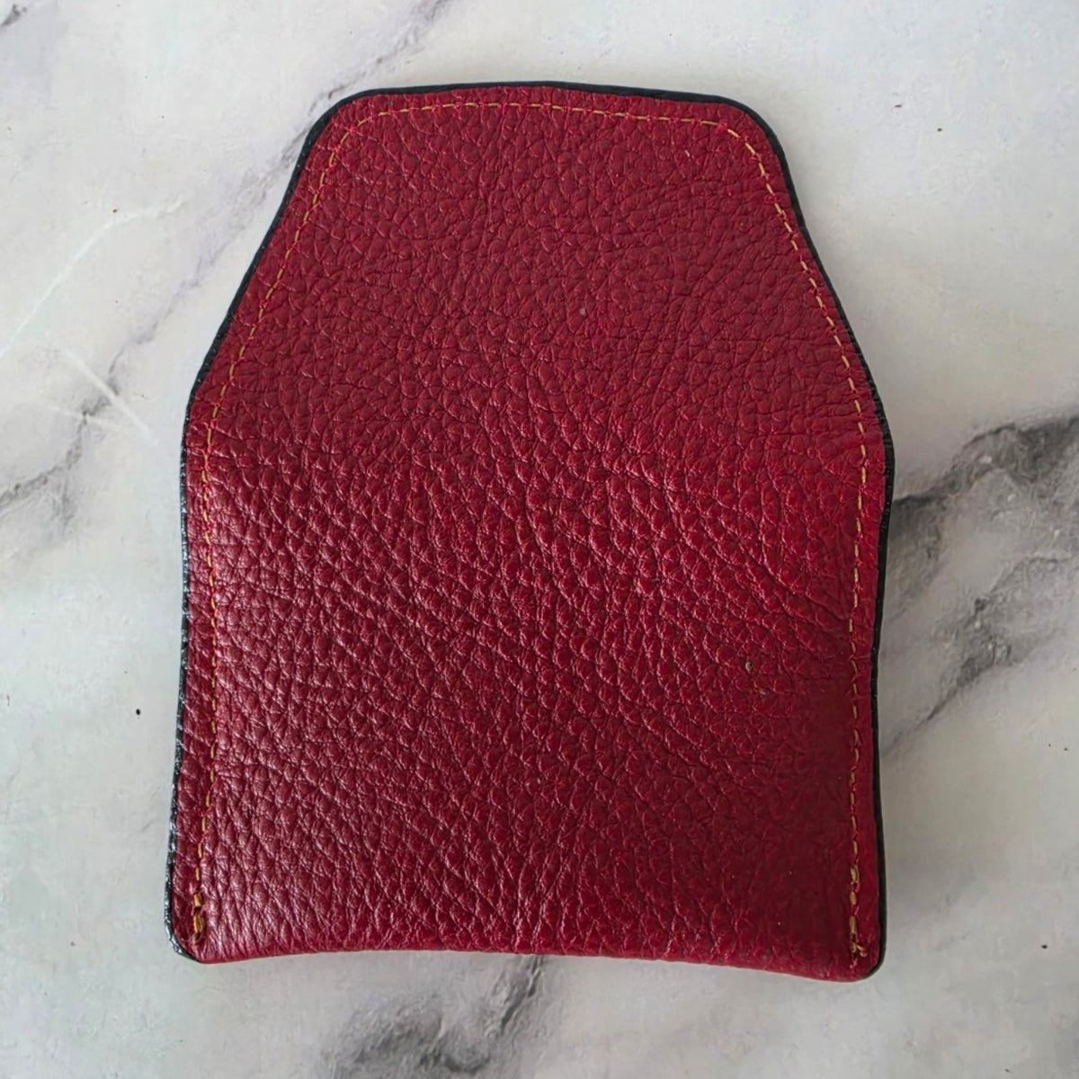 Back view of crimson red pebbled leather keeper pouch