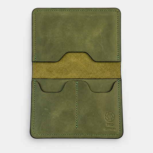 Green handmade leather passport holder by Tad Leathers