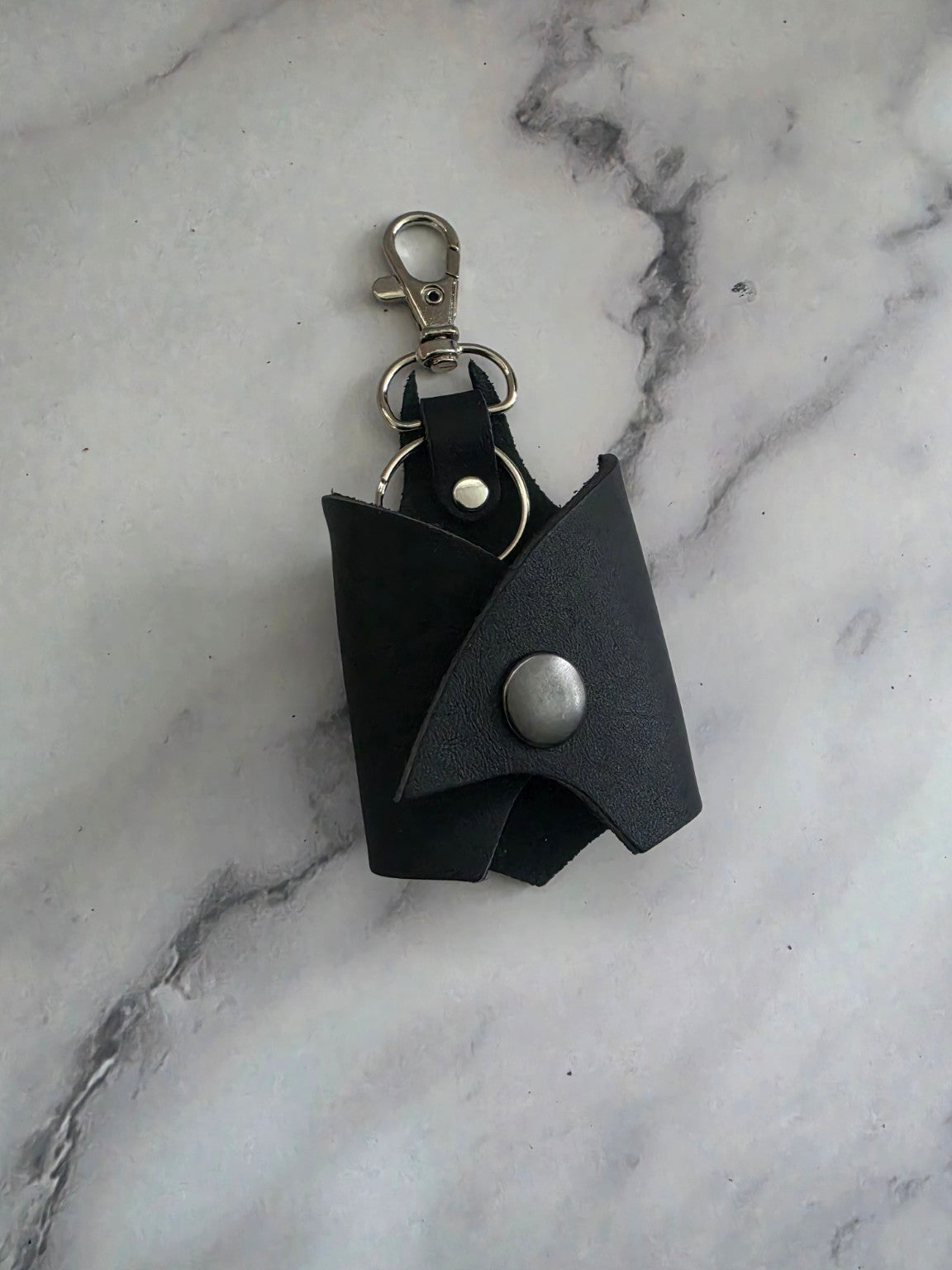 Midnight Bat leather key holder closed at an angle
