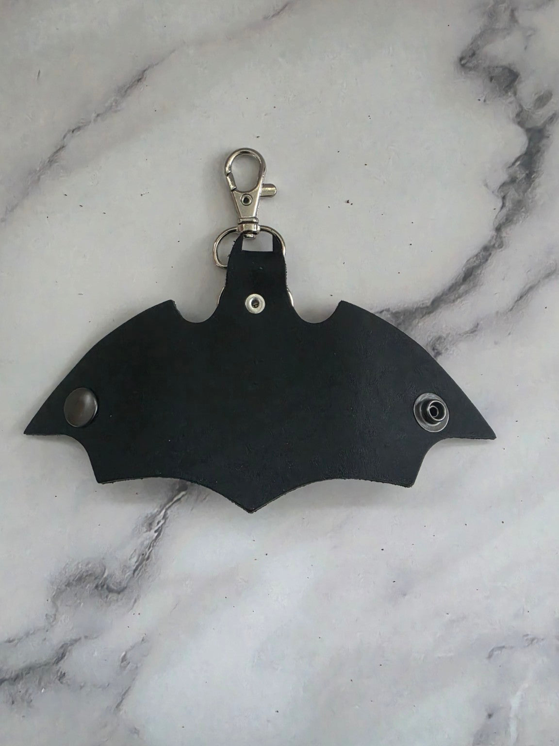 Back of open Midnight Bat leather key holder