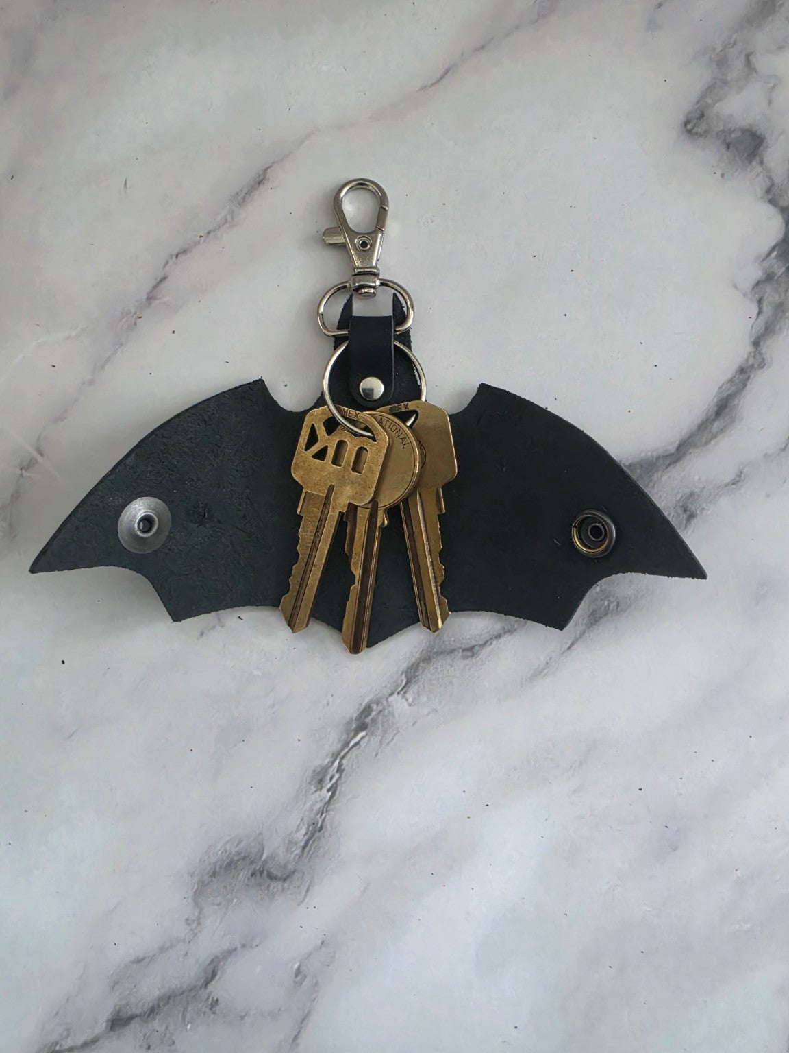 Midnight Bat leather key holder holding keys