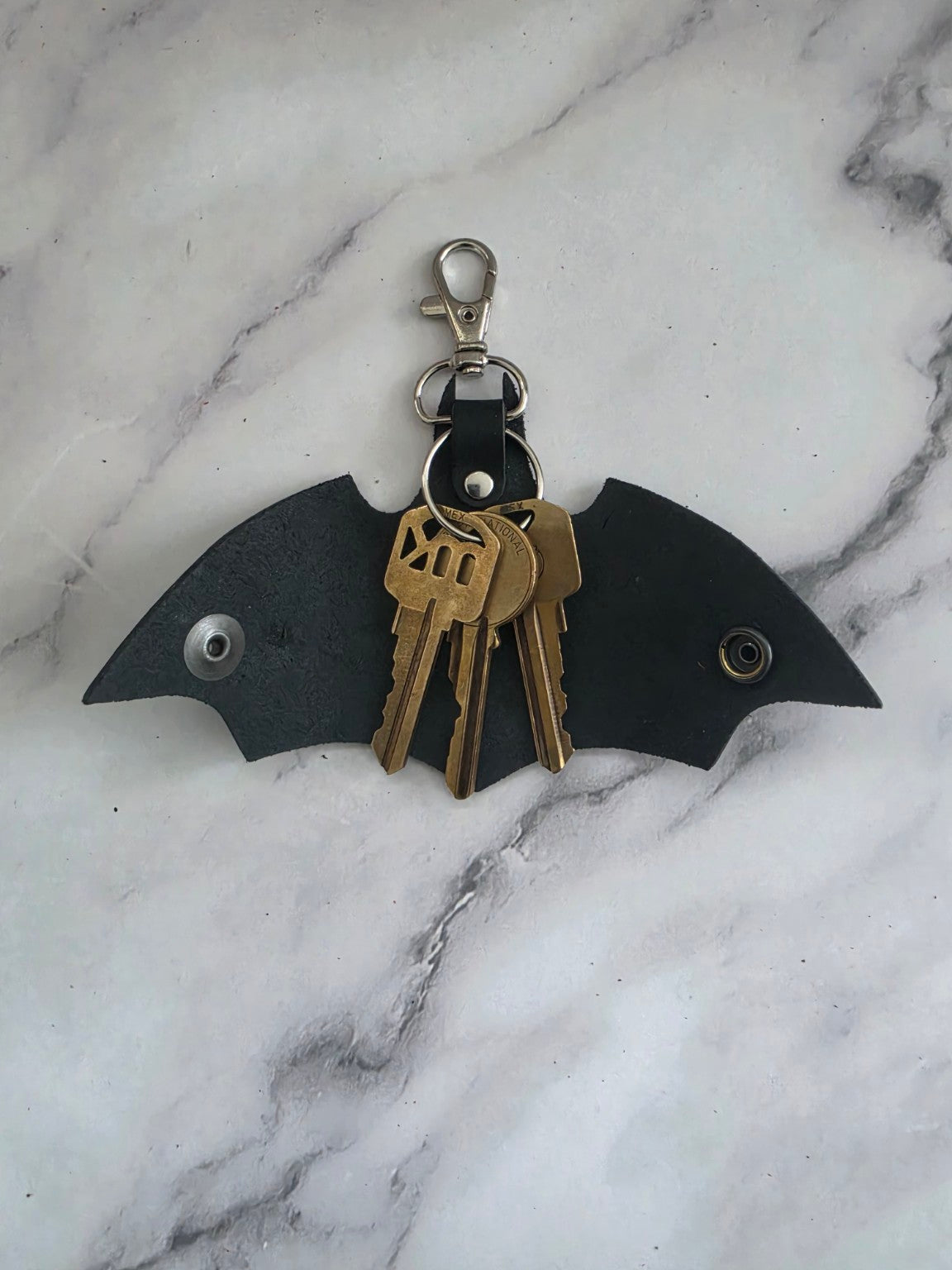Midnight Bat leather key holder with keys displayed
