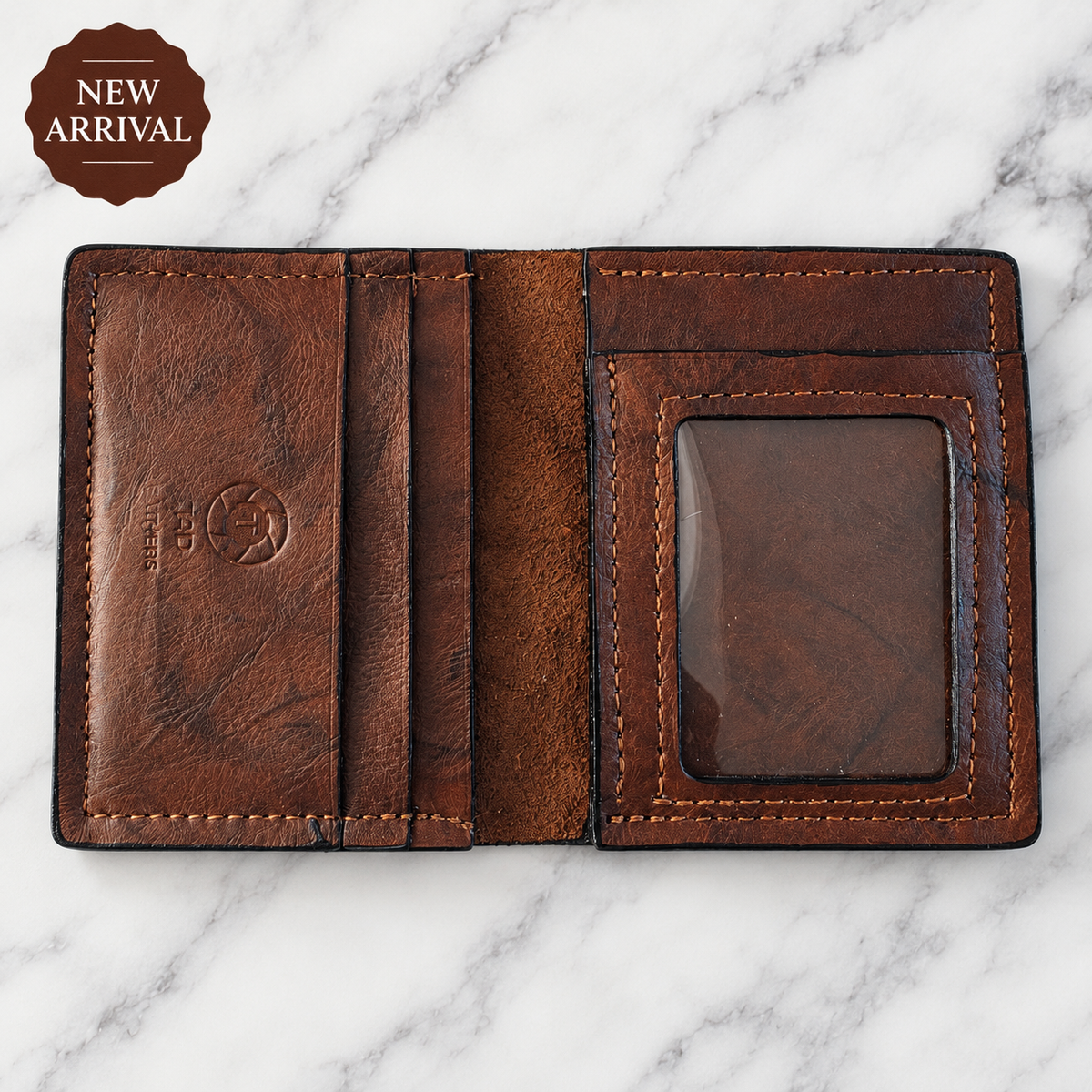 Rustic brown leather ID wallet open showing card pockets and clear ID window on marble, New Arrival