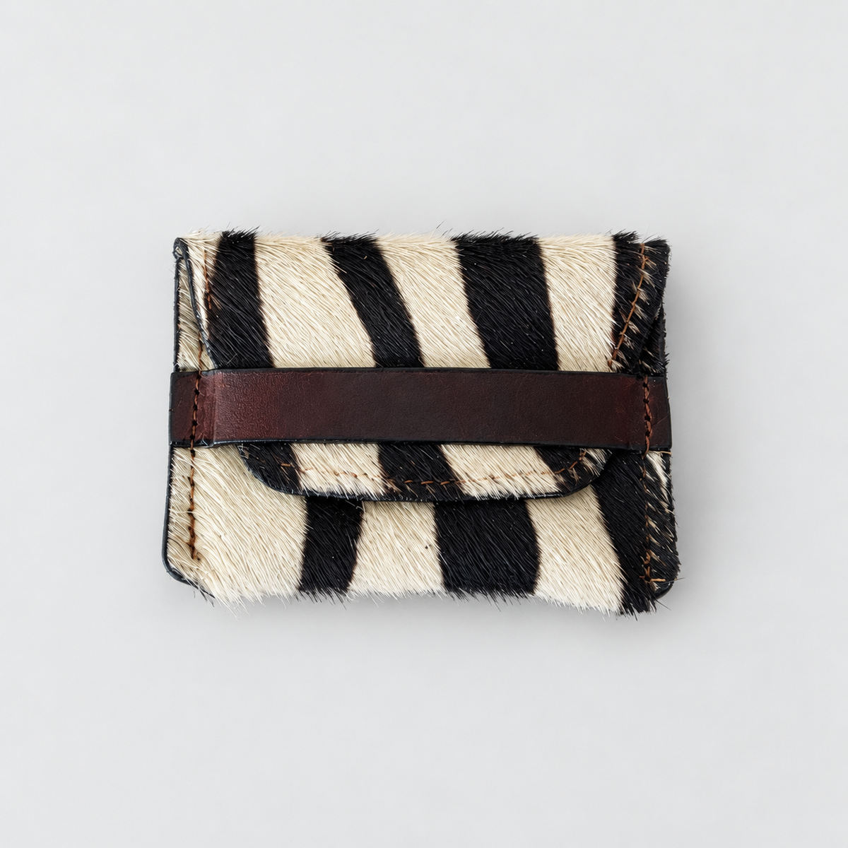 Savanna Stripe zebra-pattern hair-on-hide leather pouch, front view
