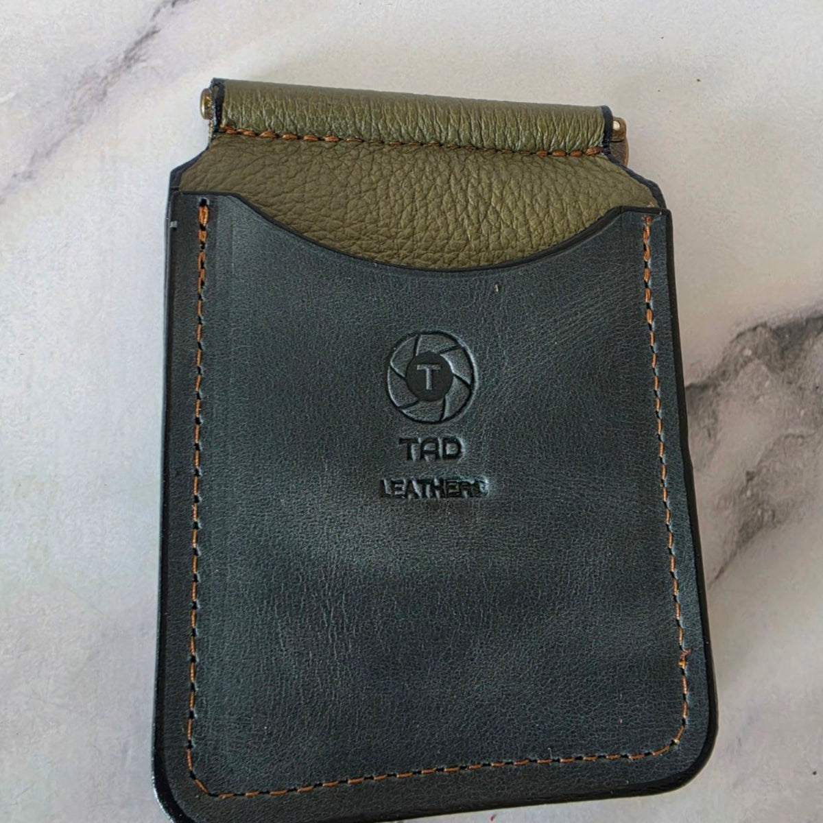 Shadow charcoal and olive leather spring-bar money clip wallet, front view