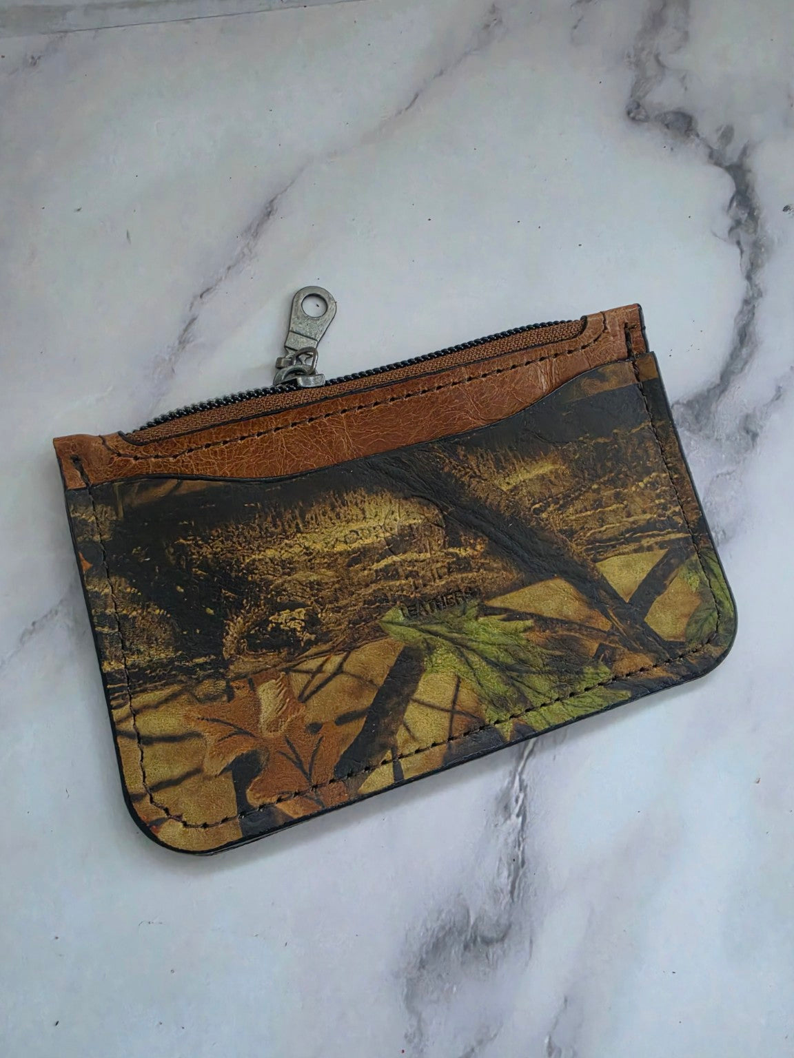 Woodland Camo leather zipper pouch angled view