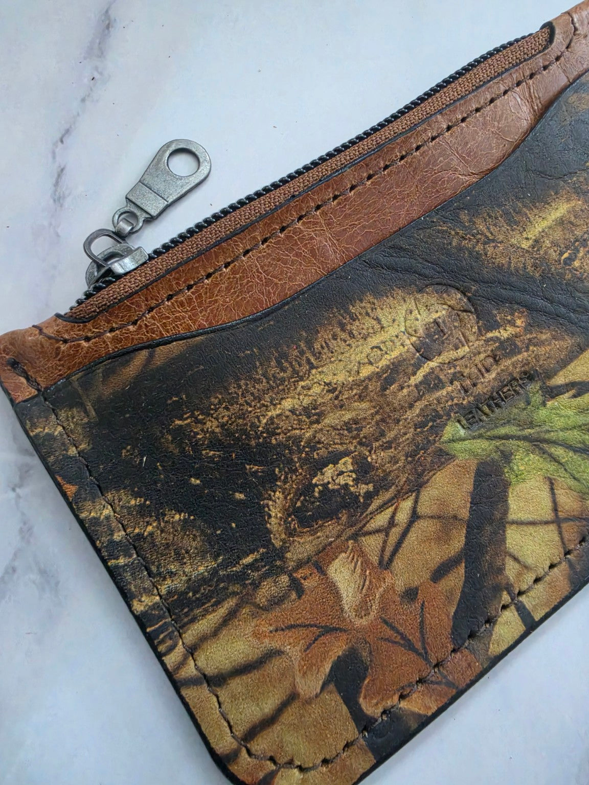 Woodland Camo leather zipper pouch stitching detail